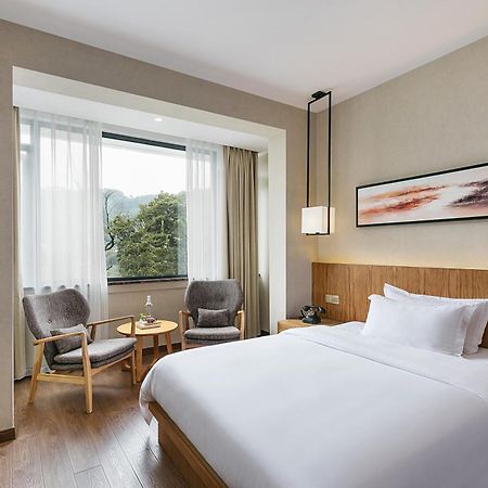 Hangzhou Puyu Travelling With Hotel מראה חיצוני תמונה