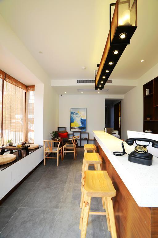 Hangzhou Puyu Travelling With Hotel מראה חיצוני תמונה