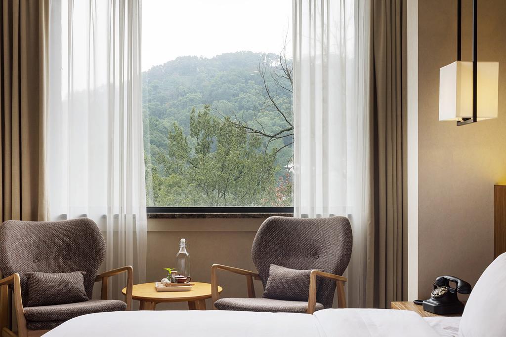 Hangzhou Puyu Travelling With Hotel מראה חיצוני תמונה