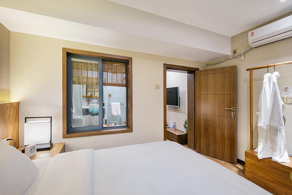 Hangzhou Puyu Travelling With Hotel מראה חיצוני תמונה